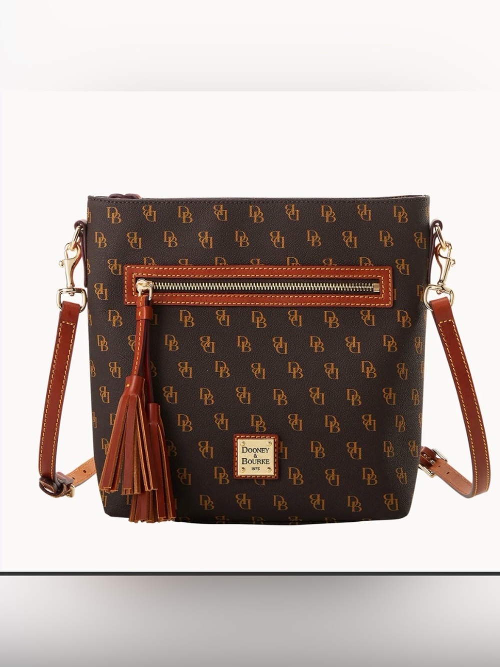 Dooney & Bourke. NWOT Lani Crossbody in Brown Tmoro color. Pristine condition!